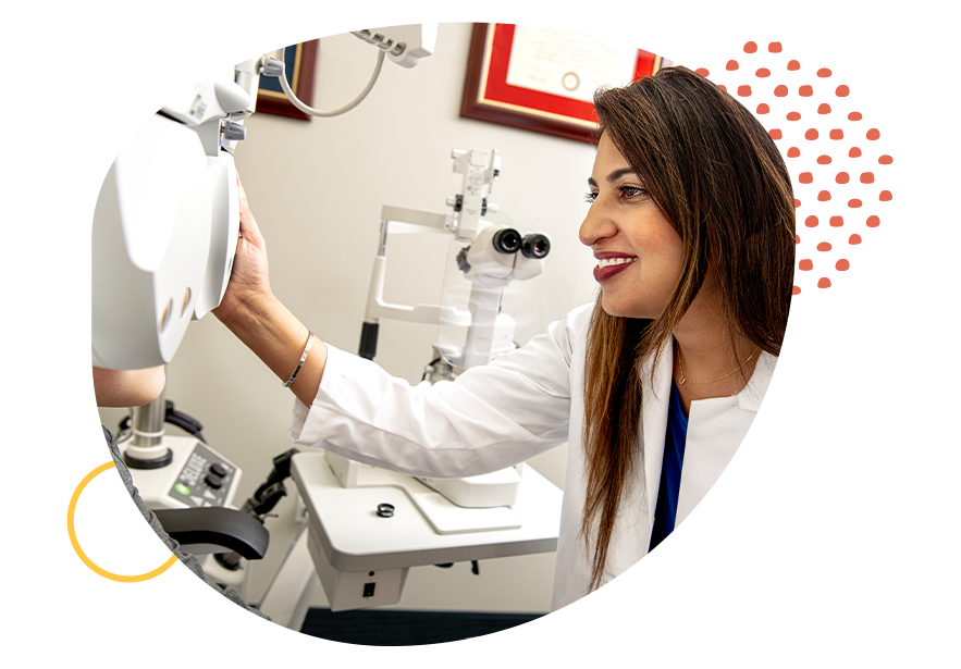 Woman optometrist performing an eye exam